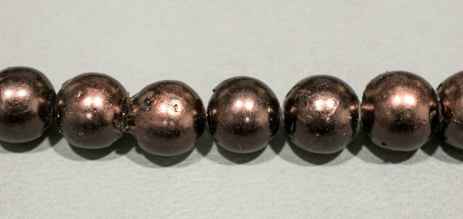 Perlenstrang Braun rund mit hohem Lüster in 13 mm